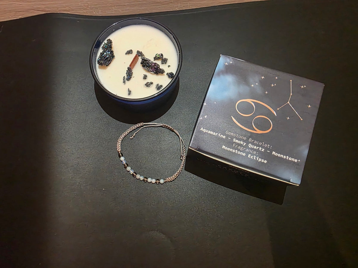 Cancer zodiac candle top view with bracelet and box