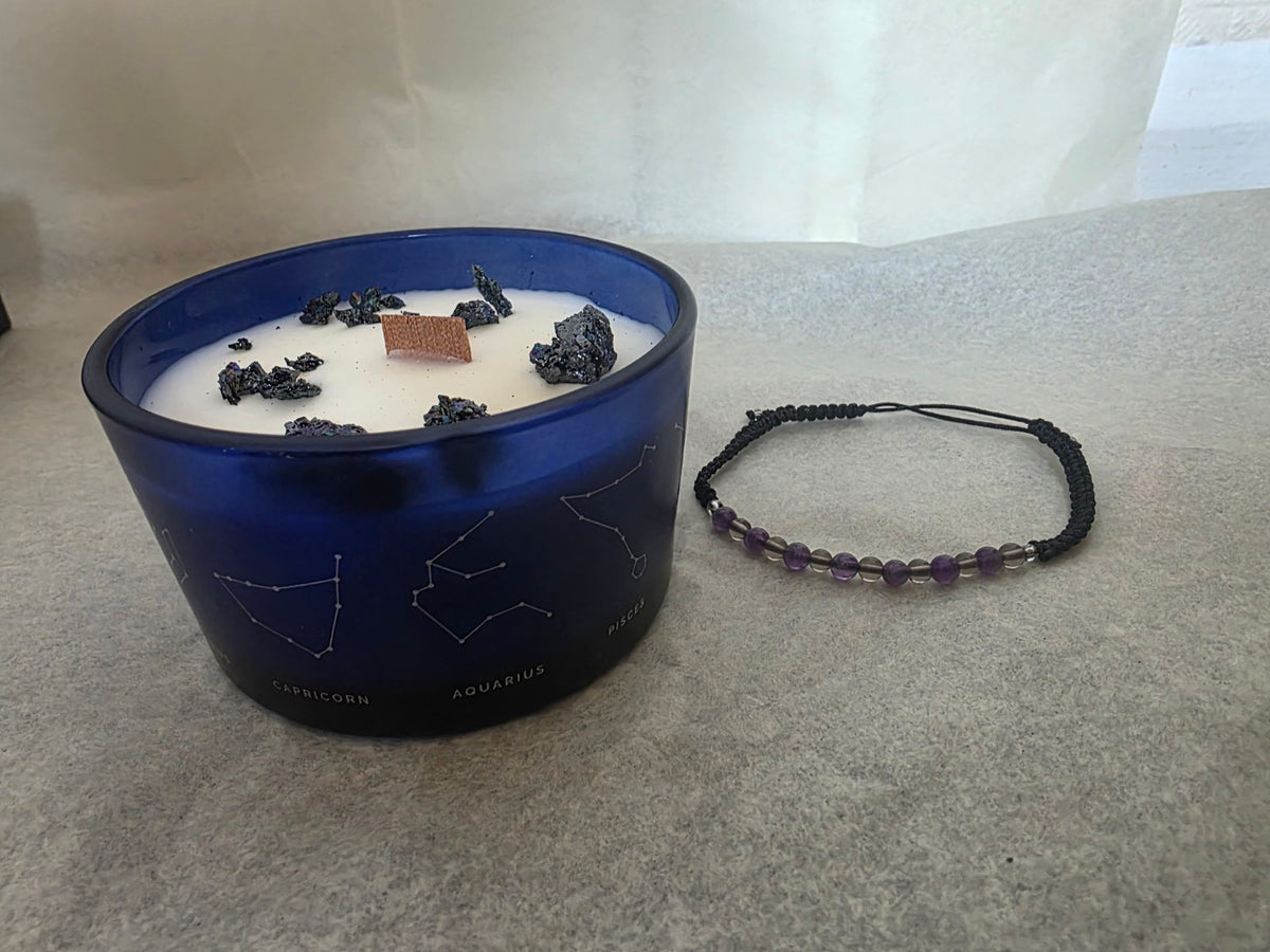 Blue Capricorn zodiac candle with amethyst and smoky quartz gemstone bracelet
