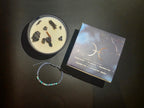Pisces candle, gemstone bracelet and box shown from above